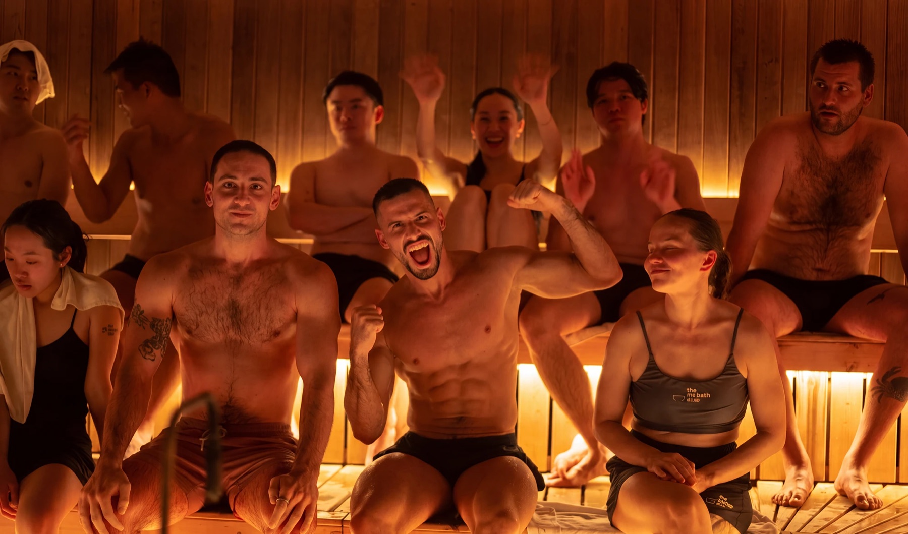 A group of members cheering in the sauna at The Ice Bath Club