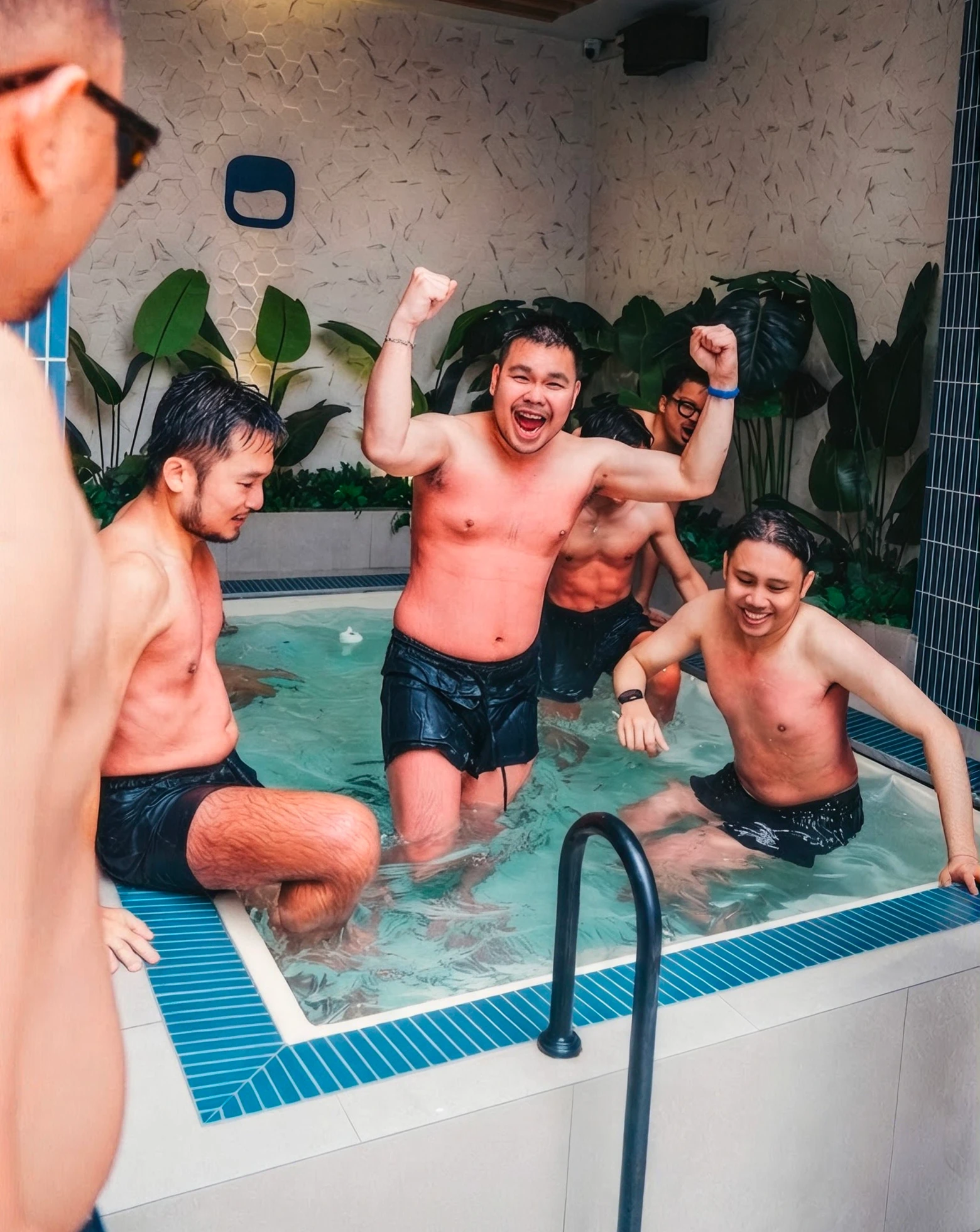 Members celebrating in the ice bath