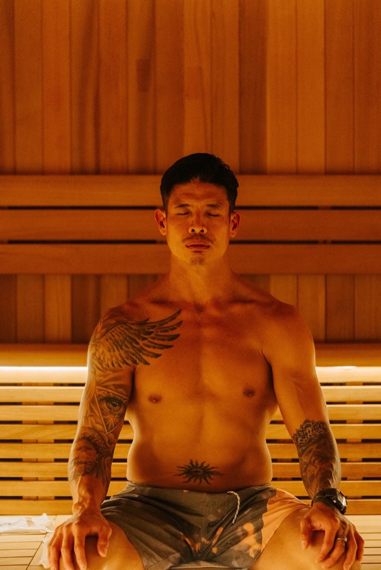 A member breathing through the heat in the sauna